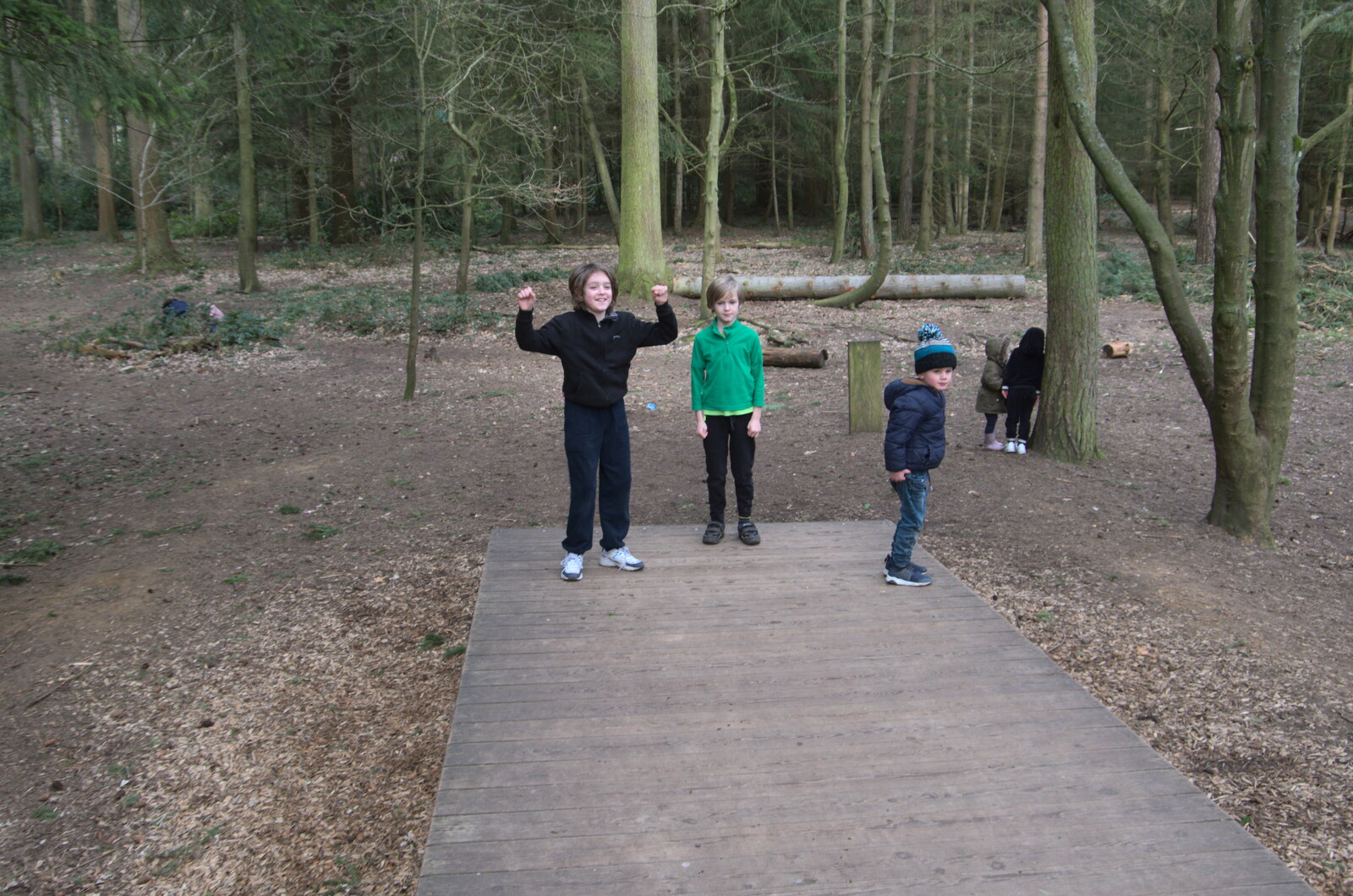 The boys stand on the end of the massive seesaw from A Trip to High Lodge, Brandon, Suffolk - 7th March 2020
