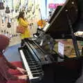 Harry plays the piano a bit, A Trip to Cooke's Music, St. Benedict's Street, Norwich - 14th March 2020