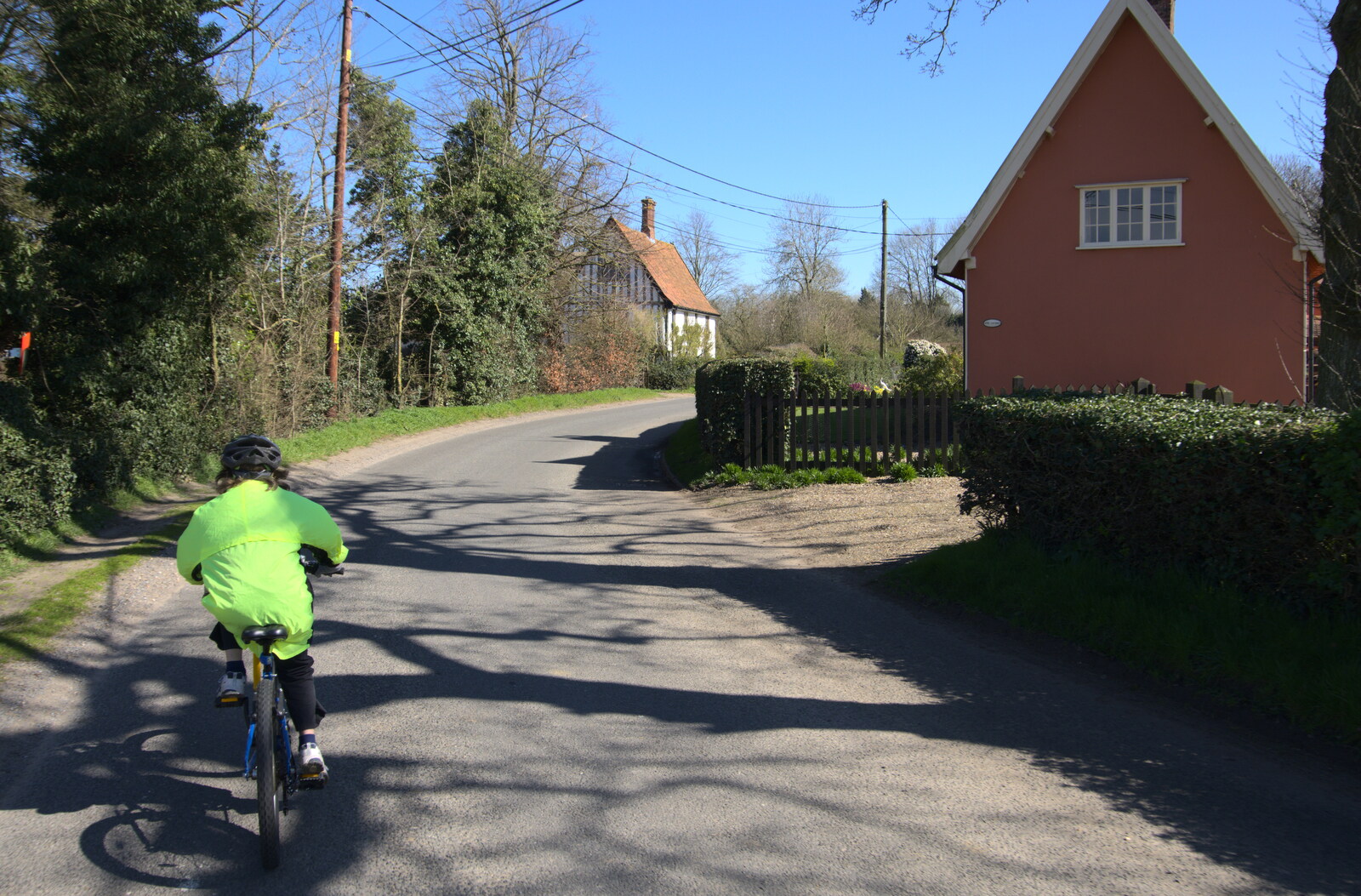 Fred on a bike cycling through Brome from Life Before Lockdown: A March Miscellany - 22nd March 2020