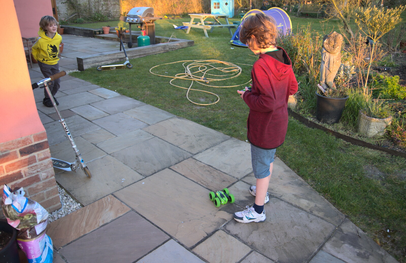 Fred drives a remote-control car on the patio from An April Lockdown Miscellany, Eye, Suffolk - 10th April 2020