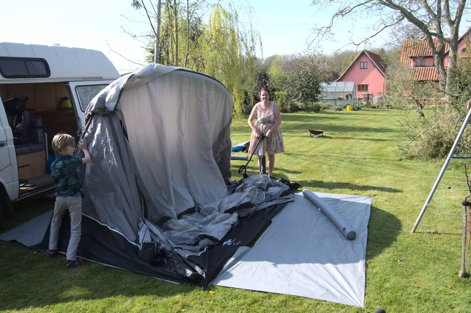 Isobel pumps the awning up, from A Weekend Camping Trip in the Garden, Brome, Suffolk - 11th April 2020