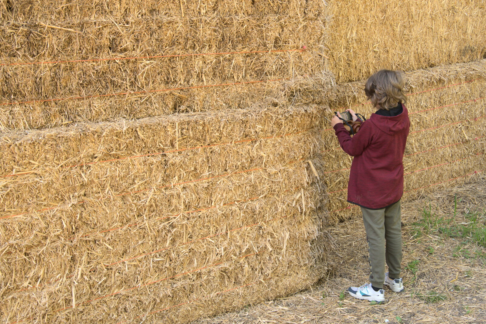 Fred takes a photo of straw bales from Lost Cat and a Walk on Nick's Lane, Brome, Suffolk - 26th April 2020