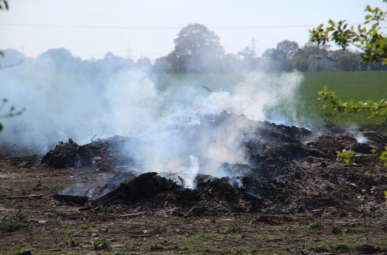 There's a smouldering bonfire on the farm from Lost Cat and a Walk on Nick's Lane, Brome, Suffolk - 26th April 2020