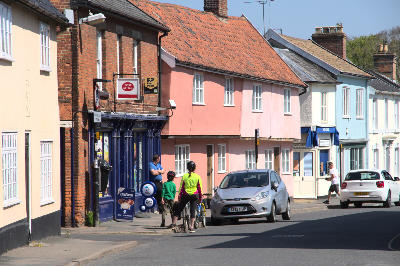 Isobel waits outside the Blue McColl's Shop from Lost Cat and a Walk on Nick's Lane, Brome, Suffolk - 26th April 2020