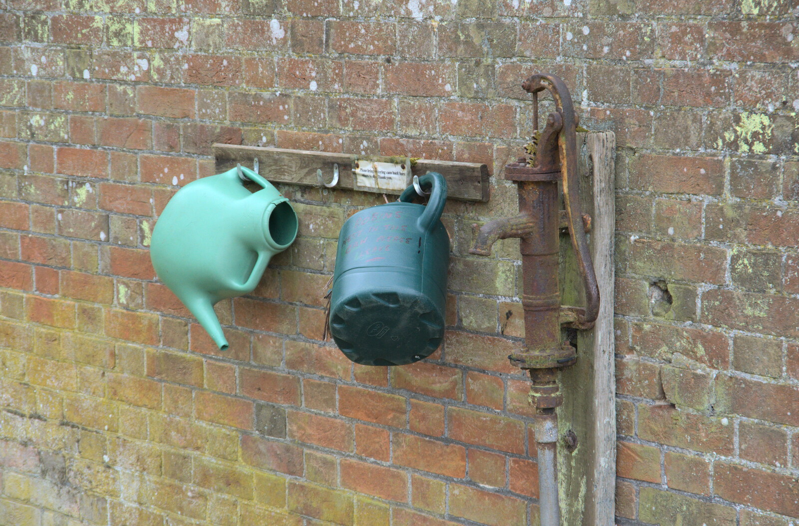 An old water pump and some watering cans from The Quest for Rapsy Tapsy Lane, Eye, Suffolk - 6th May 2020