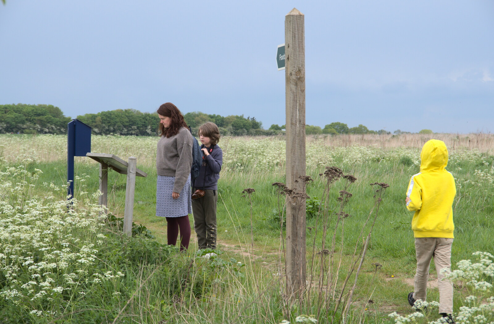 Isobel reads one of the airfield information boards from The Quest for Rapsy Tapsy Lane, Eye, Suffolk - 6th May 2020