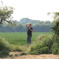 Isobel looks around for more low-flying planes, Pin-hole Cameras and a Red Arrows Flypast, Brome, Suffolk - 8th May 2020