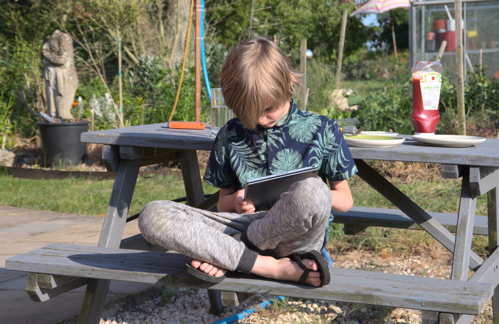 Harry's on a tablet again from A Walk up Rapsy Tapsy Lane, Eye, Suffolk - 9th May 2020