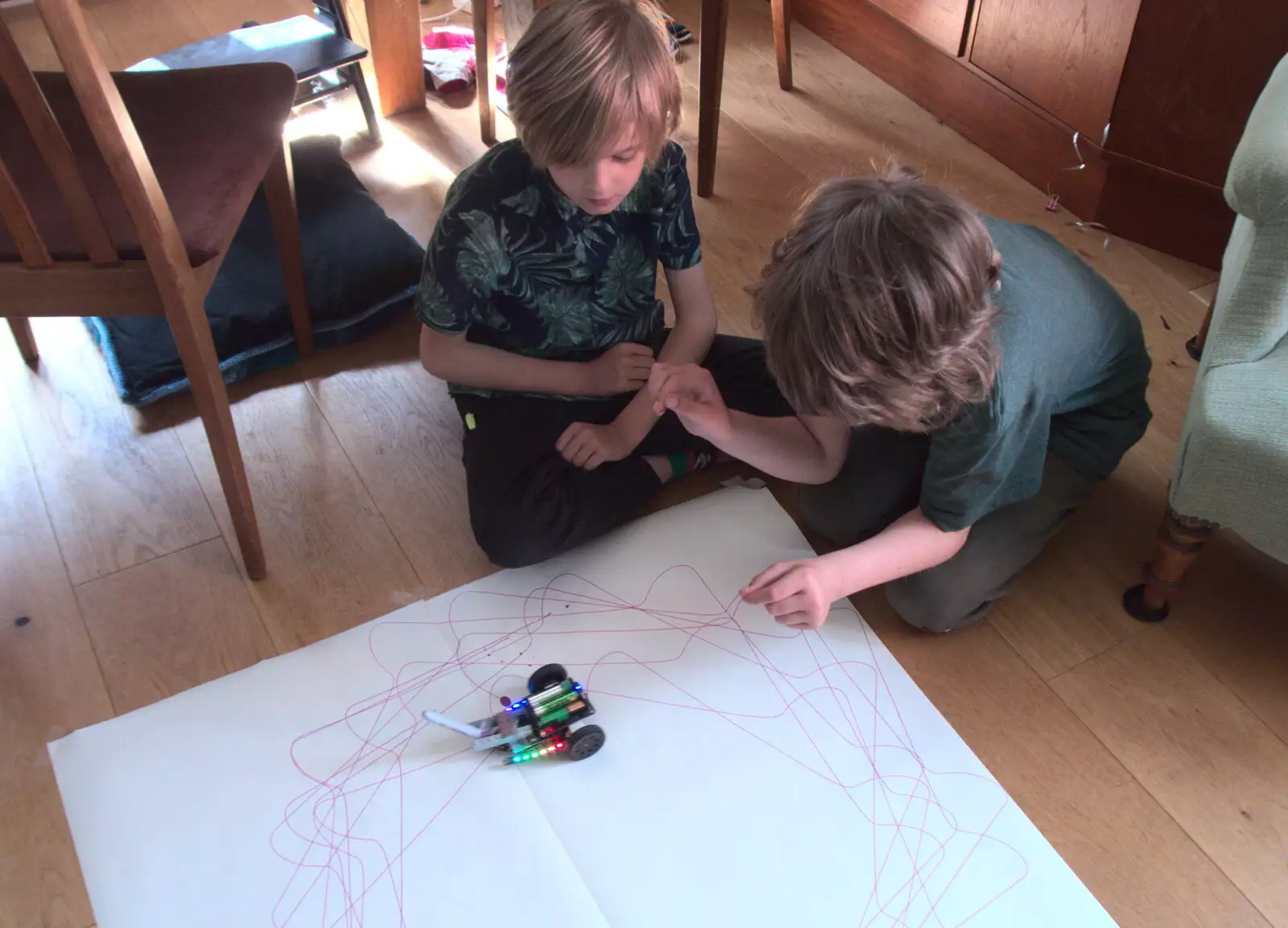 The boys watch a MicroBot, from The Old Brickworks and a New Road, Hoxne and Eye, Suffolk - 26th May 2020