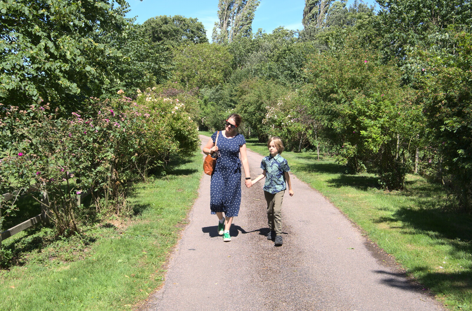 Isobel and Harry on the path past the Abbey from A Walk Around Abbey Bridges, Eye, Suffolk - 5th July 2020