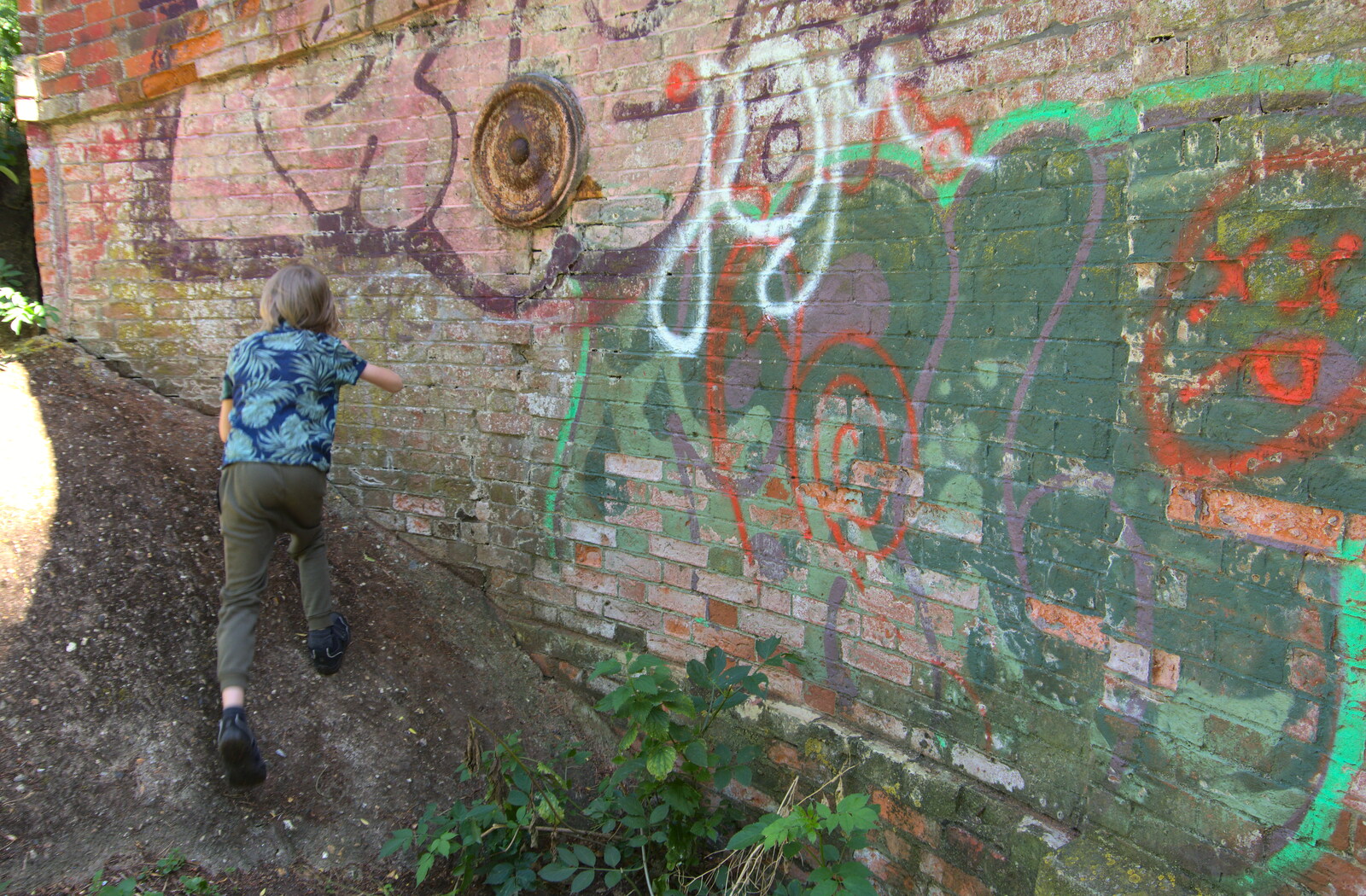 Harry runs past some graffiti from A Walk Around Abbey Bridges, Eye, Suffolk - 5th July 2020