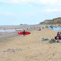 A surfer hauls out to sea, Camping on the Coast, East Runton, North Norfolk - 25th July 2020