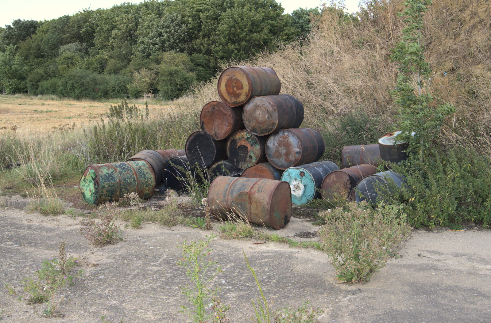 A pile of old oil drums from Eye Airfield with Mick the Brick, Eye, Suffolk - 5th August 2020