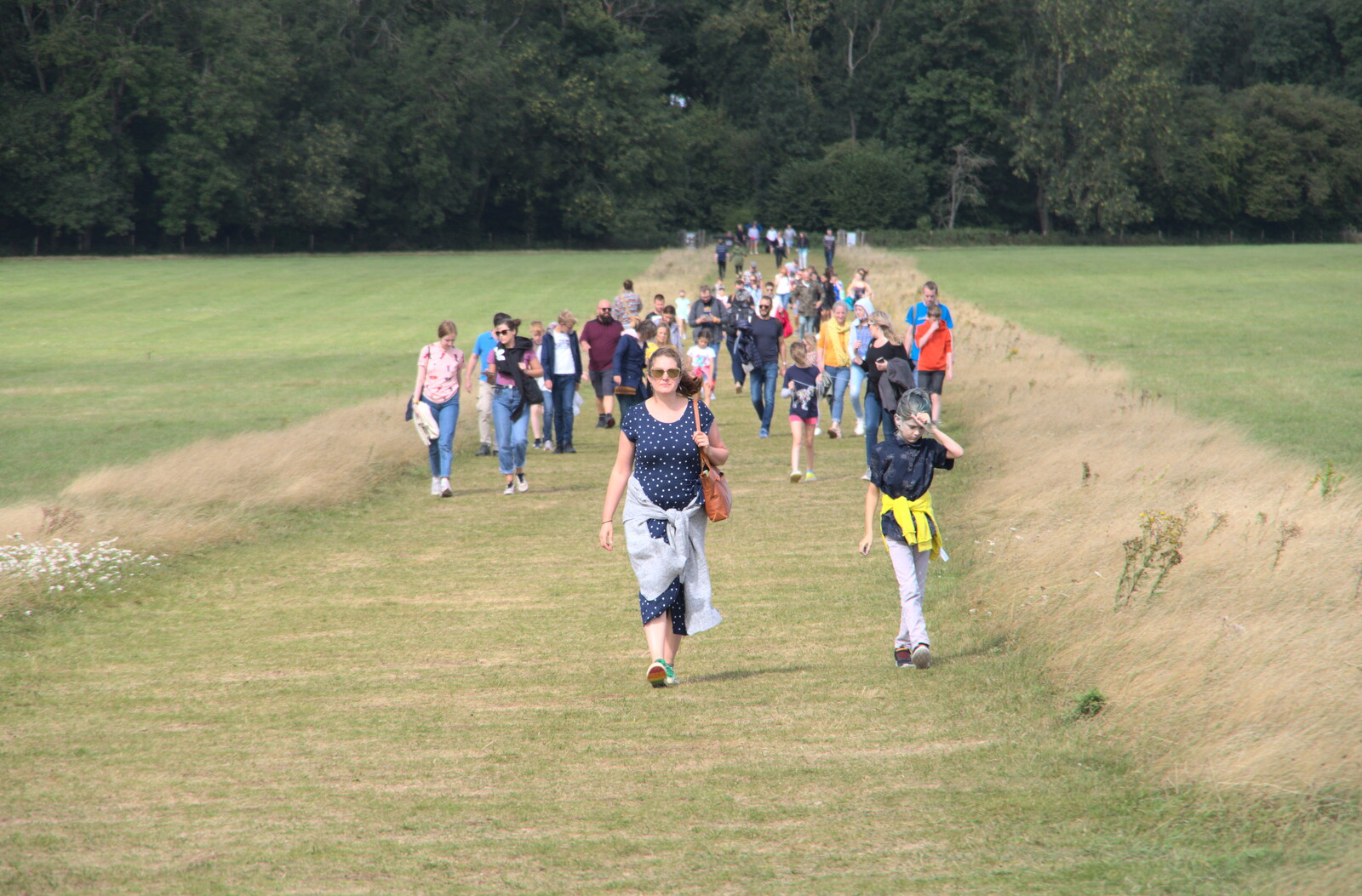 The crowds walk the path past the Cursus from Stone Circles: Stonehenge and Avebury, Wiltshire - 22nd August 2020