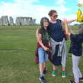 Harry tries to hide under his hoodie, Stone Circles: Stonehenge and Avebury, Wiltshire - 22nd August 2020