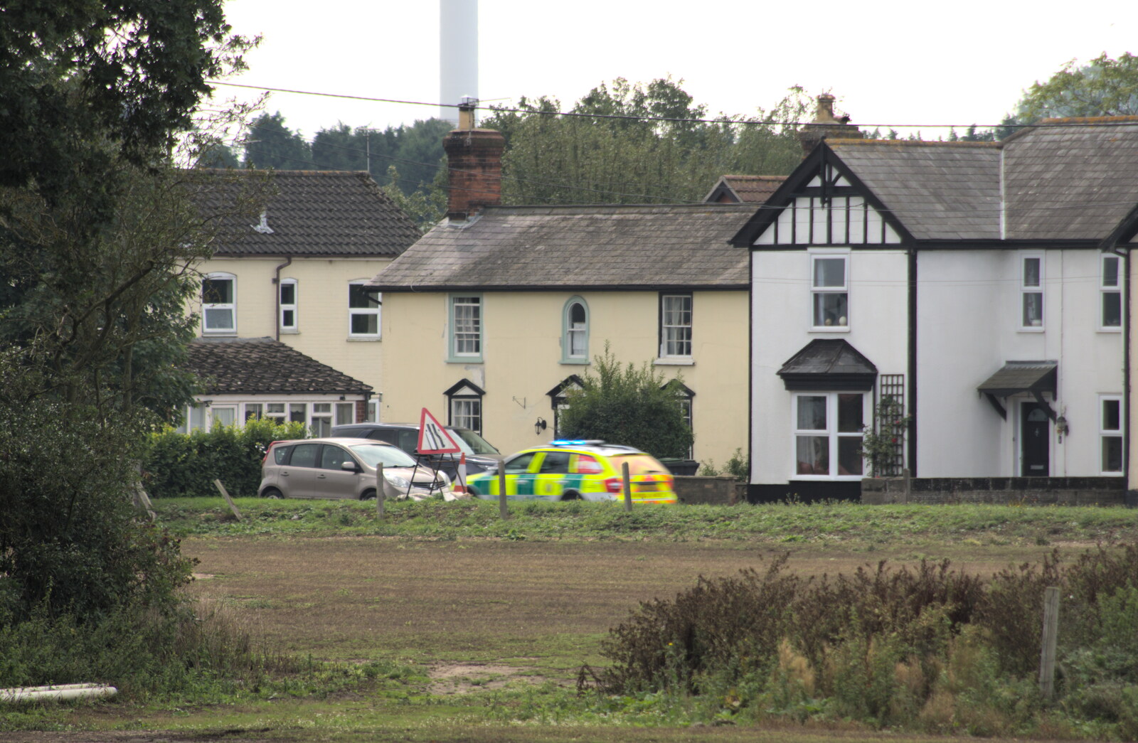 A paramedic ambulance roars down the Eye road from A Walk up Hound Tor, Dartmoor, Devon - 24th August 2020