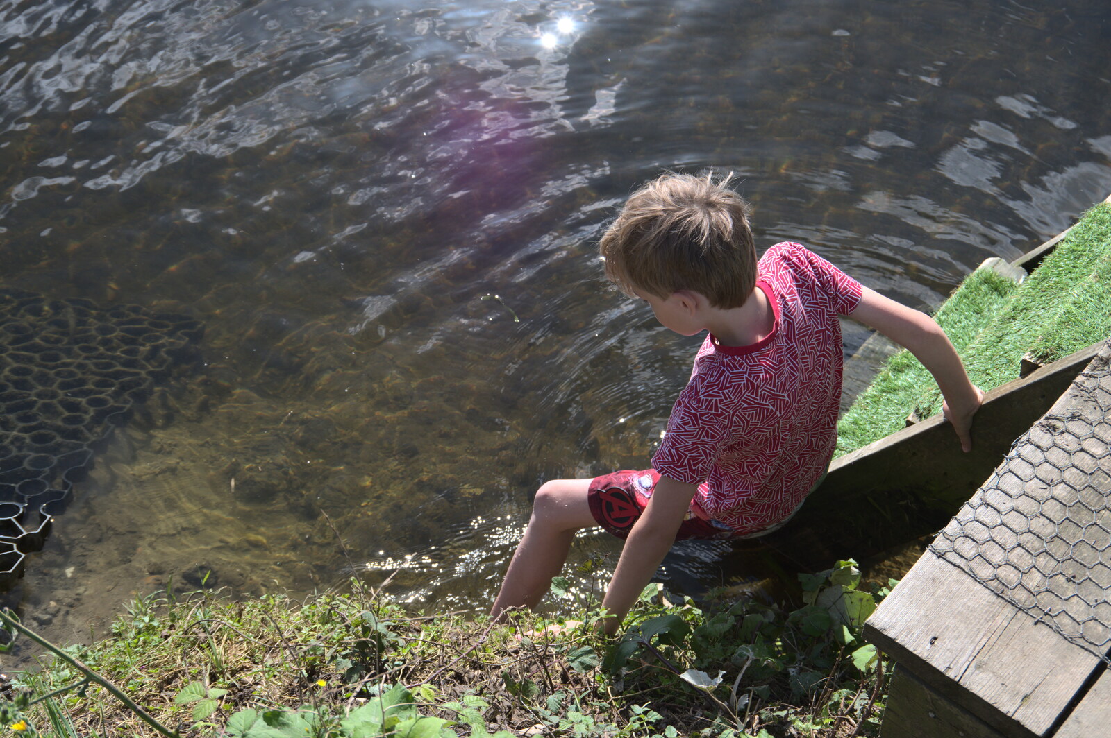 Camping at Three Rivers, Geldeston, Norfolk - 5th September 2020: Harry sticks his feet in the river