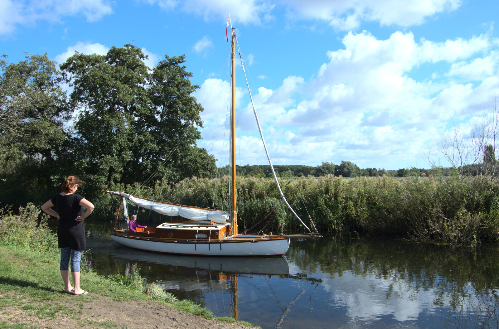 Camping at Three Rivers, Geldeston, Norfolk - 5th September 2020: A nice wooden boat motors past Isobel