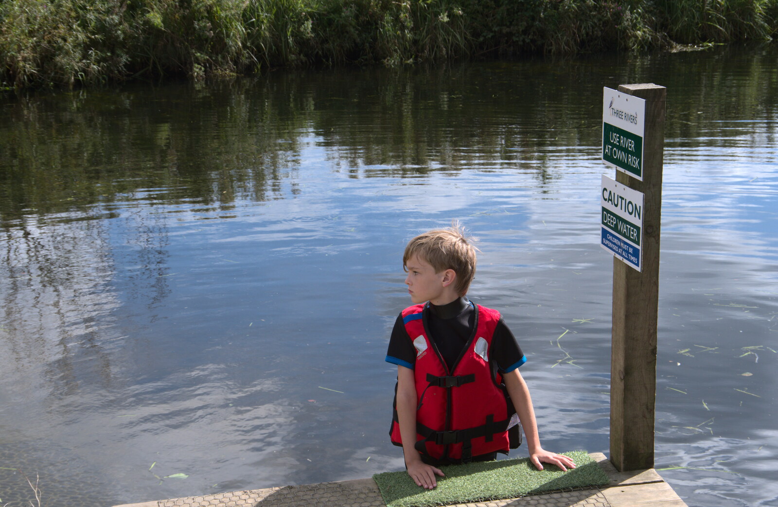 Camping at Three Rivers, Geldeston, Norfolk - 5th September 2020: Harry climbs up to the pontoon
