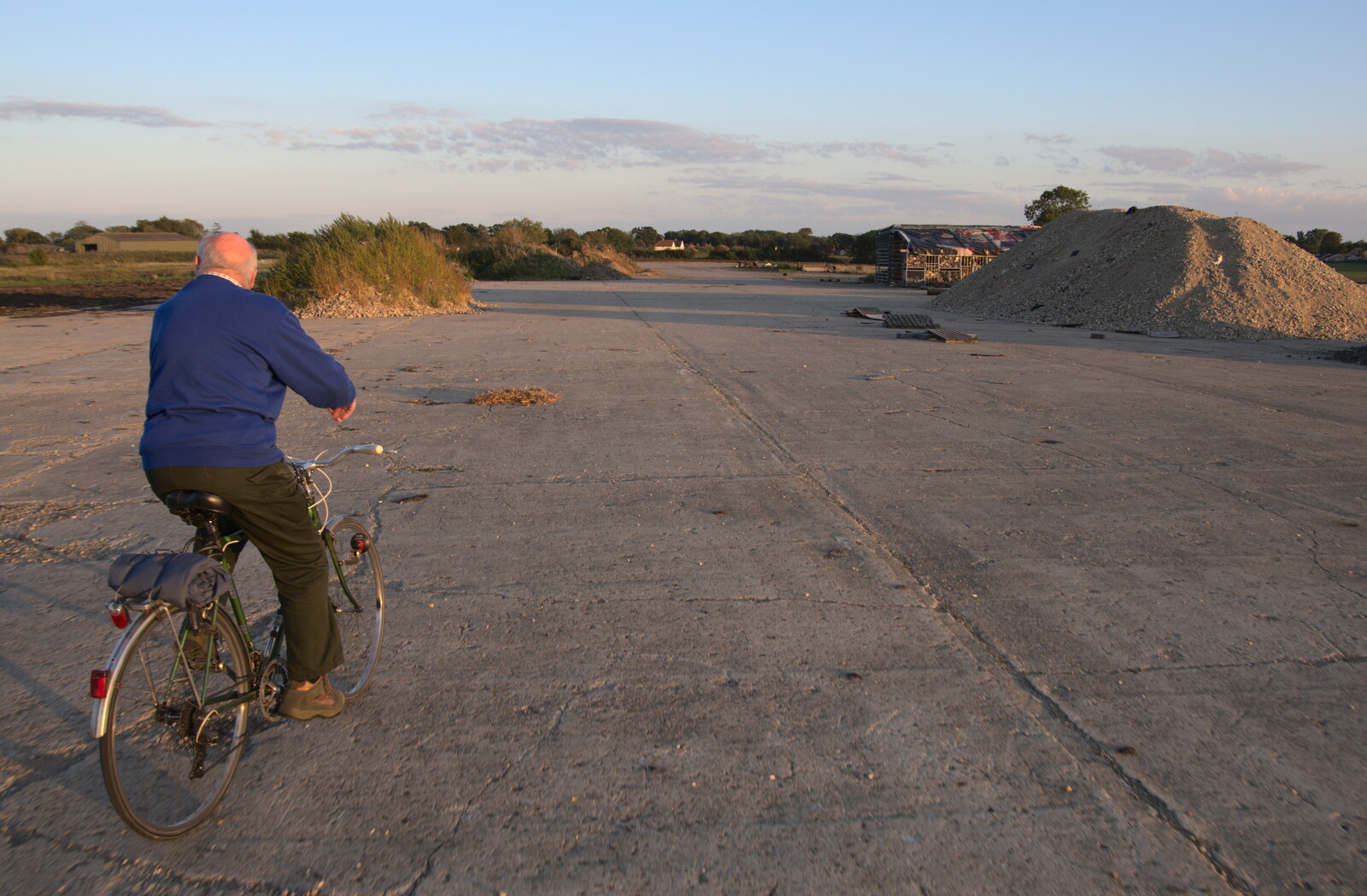 Mick cycles around on the airfield concrete from Cycling Eye Airfield and Station 119, Eye, Suffolk - 9th September 2020