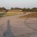 Walkers on the perimeter road, Cycling Eye Airfield and Station 119, Eye, Suffolk - 9th September 2020