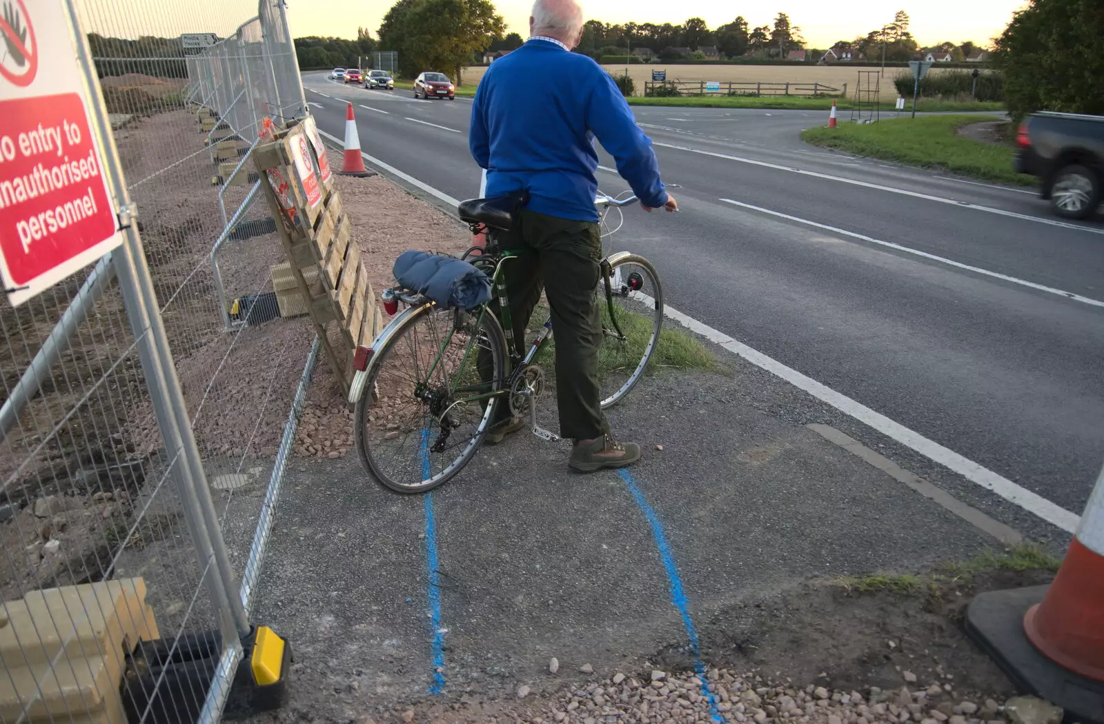 Mick waits to cross the A140, from Cycling Eye Airfield and Station 119, Eye, Suffolk - 9th September 2020