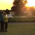 Fred and Harry with a phone, in the sunset, Star Wing's Hops and Hogs Festival, Redgrave, Suffolk - 12th September 2020