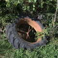 2020 A tractor wheel in a hedge