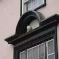 A pigeon perches on a window, A Walk Around Town, Diss, Norfolk - 10th October 2020