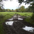 2020 A double gate into a field