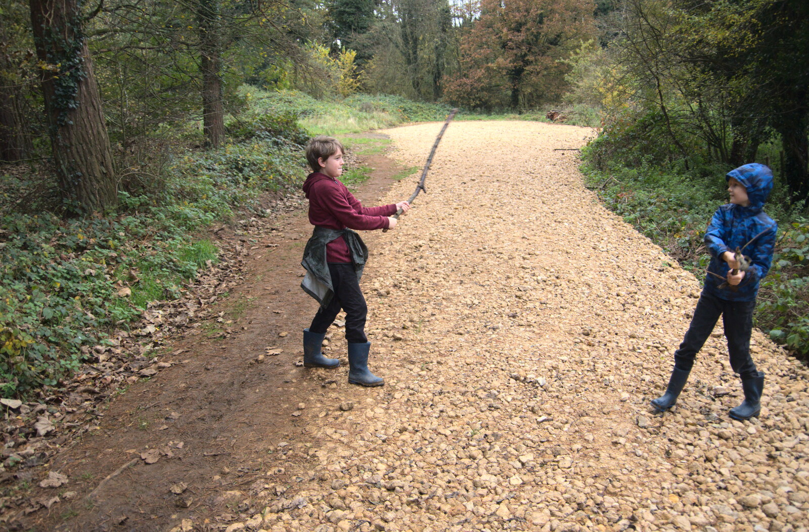 Fred and Harry sword-fight with sticks from A Trip to Lynford Arboretum, Mundford, Norfolk - 30th October 2020