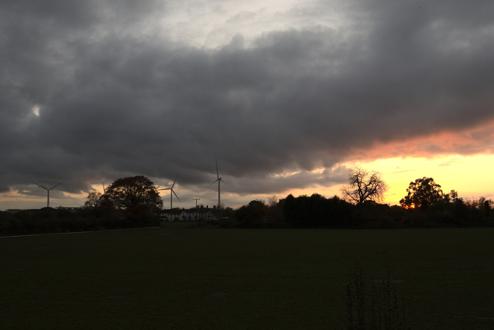 Dark clouds over the airfield turbines from Pre-Lockdown in Station 119, Eye, Suffolk - 4th November 2020