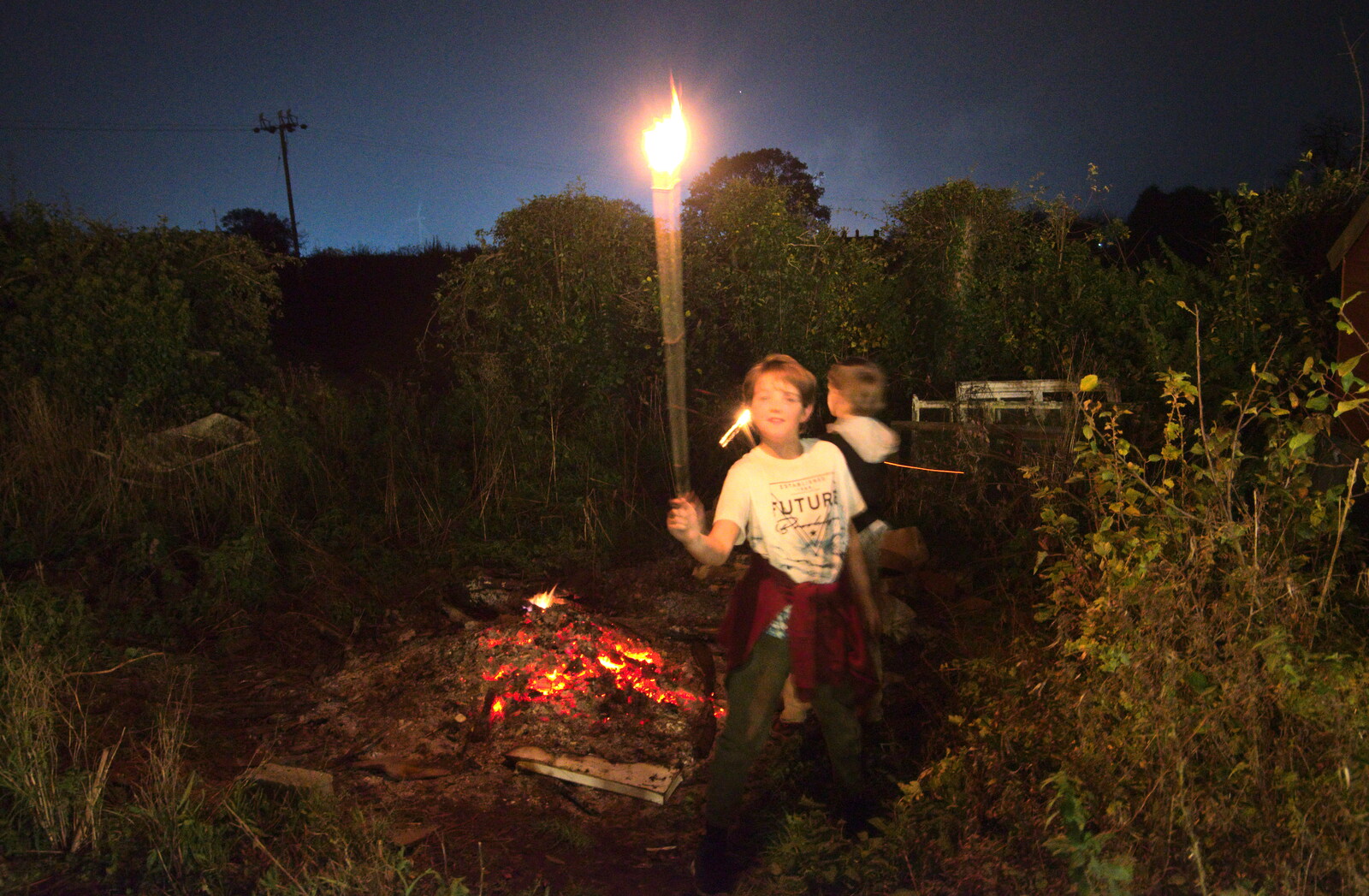 Fred's got a burning stick from the bonfire from To See the Hairy Pigs, Thrandeston, Suffolk - 7th November 2020