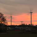 2020 The wind turbines spin in the evening glow