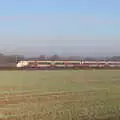 A Greater Anglia train rumbles down the line, Frosty Rides and a Christmas Tree, Diss Garden Centre, Diss, Norfolk - 29th November 2020