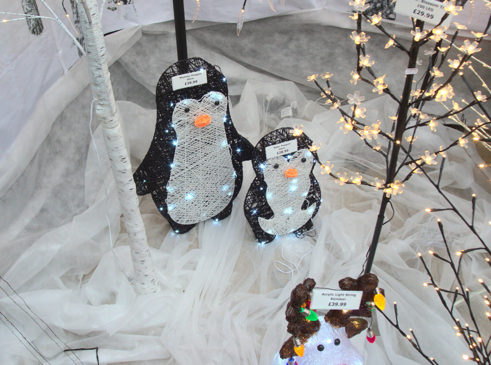 There are some amusing LED penguins for sale from Frosty Rides and a Christmas Tree, Diss Garden Centre, Diss, Norfolk - 29th November 2020