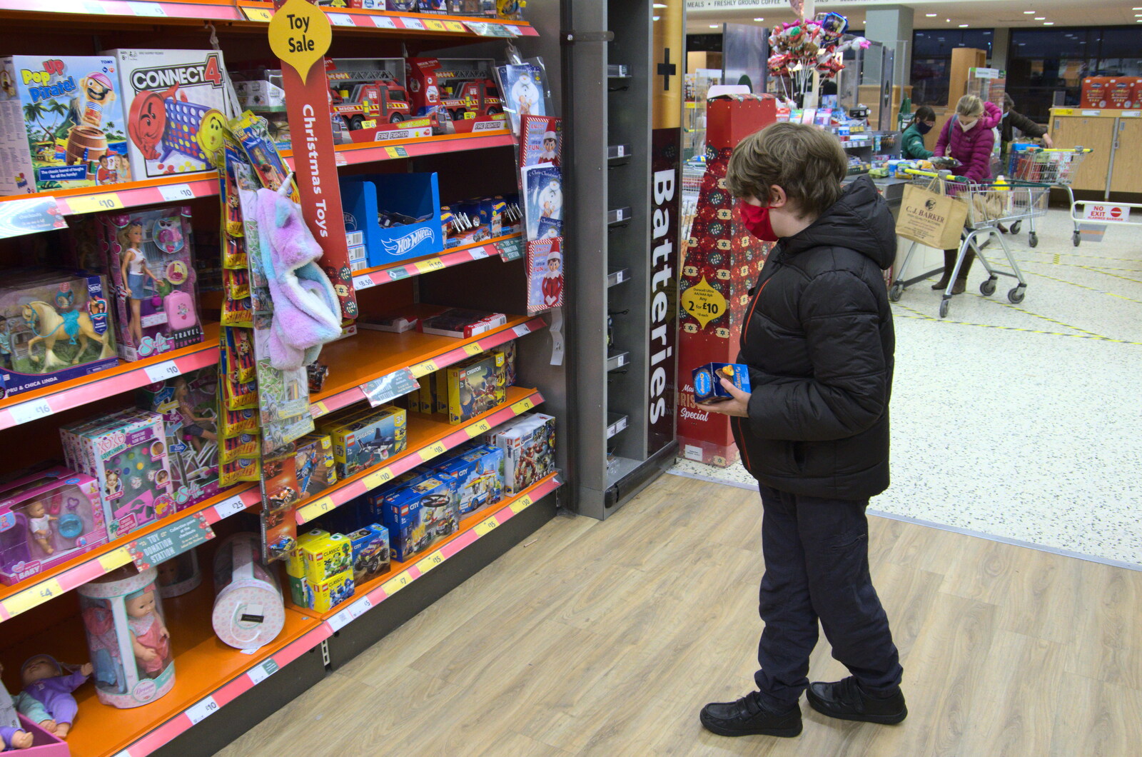 Fred looks at toys in Morrisons from A Return to the Oaksmere, Brome, Suffolk - 8th December 2020