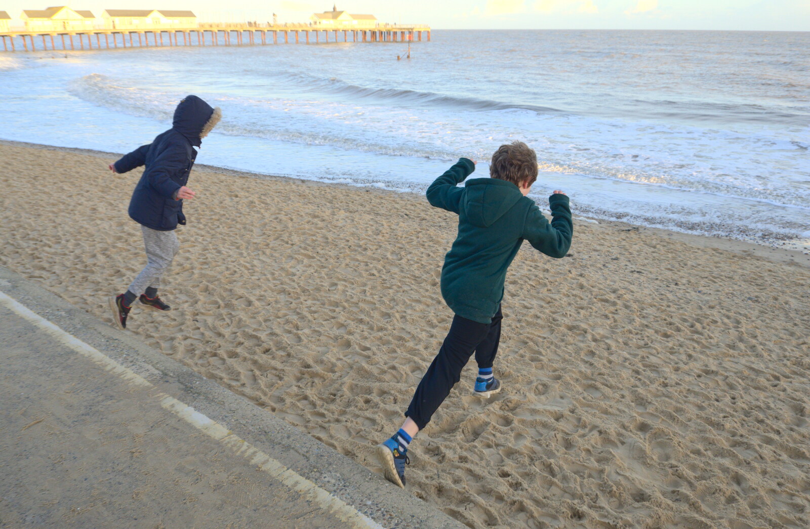 The boys have one more leap from A Return to the Beach, Southwold, Suffolk - 20th December 2020