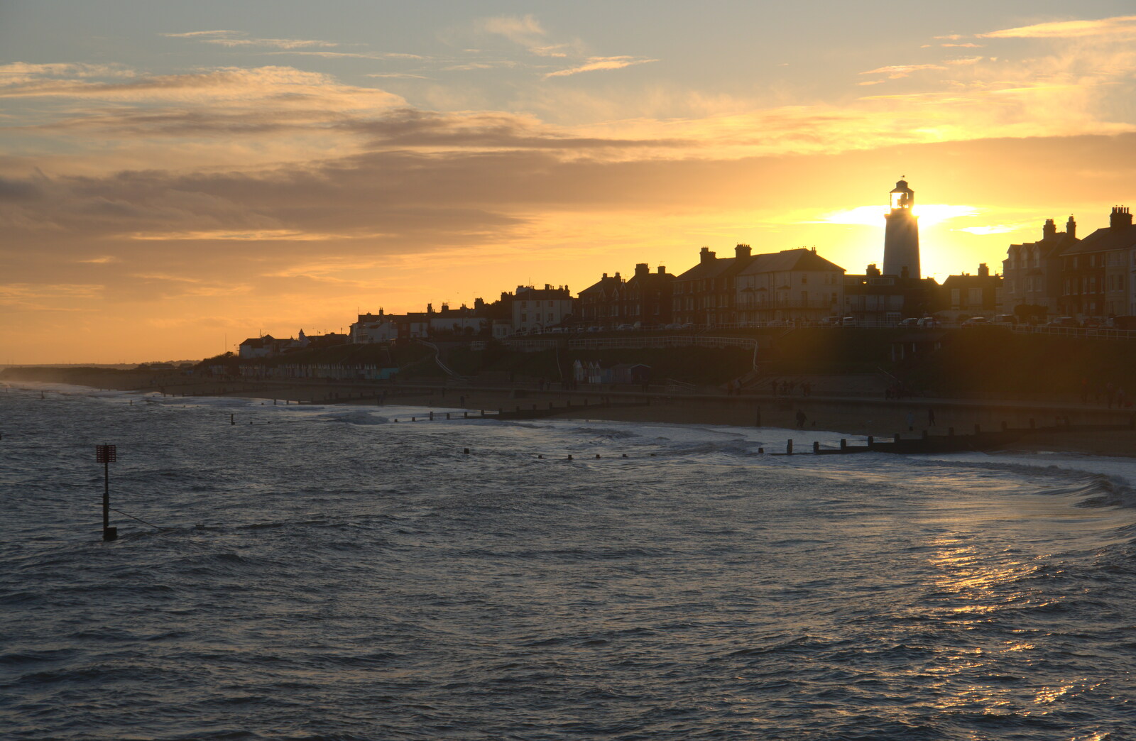 The sun sets behind the lighthouse from A Return to the Beach, Southwold, Suffolk - 20th December 2020