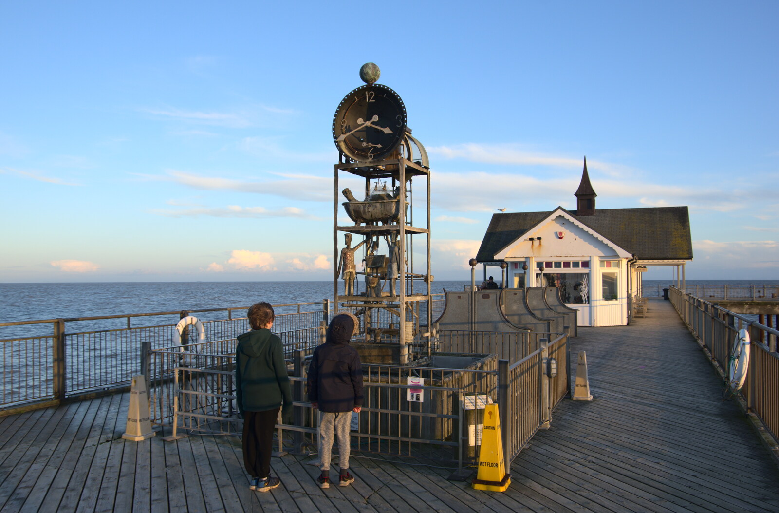The boys look at Tim Hunkin's water clock from A Return to the Beach, Southwold, Suffolk - 20th December 2020
