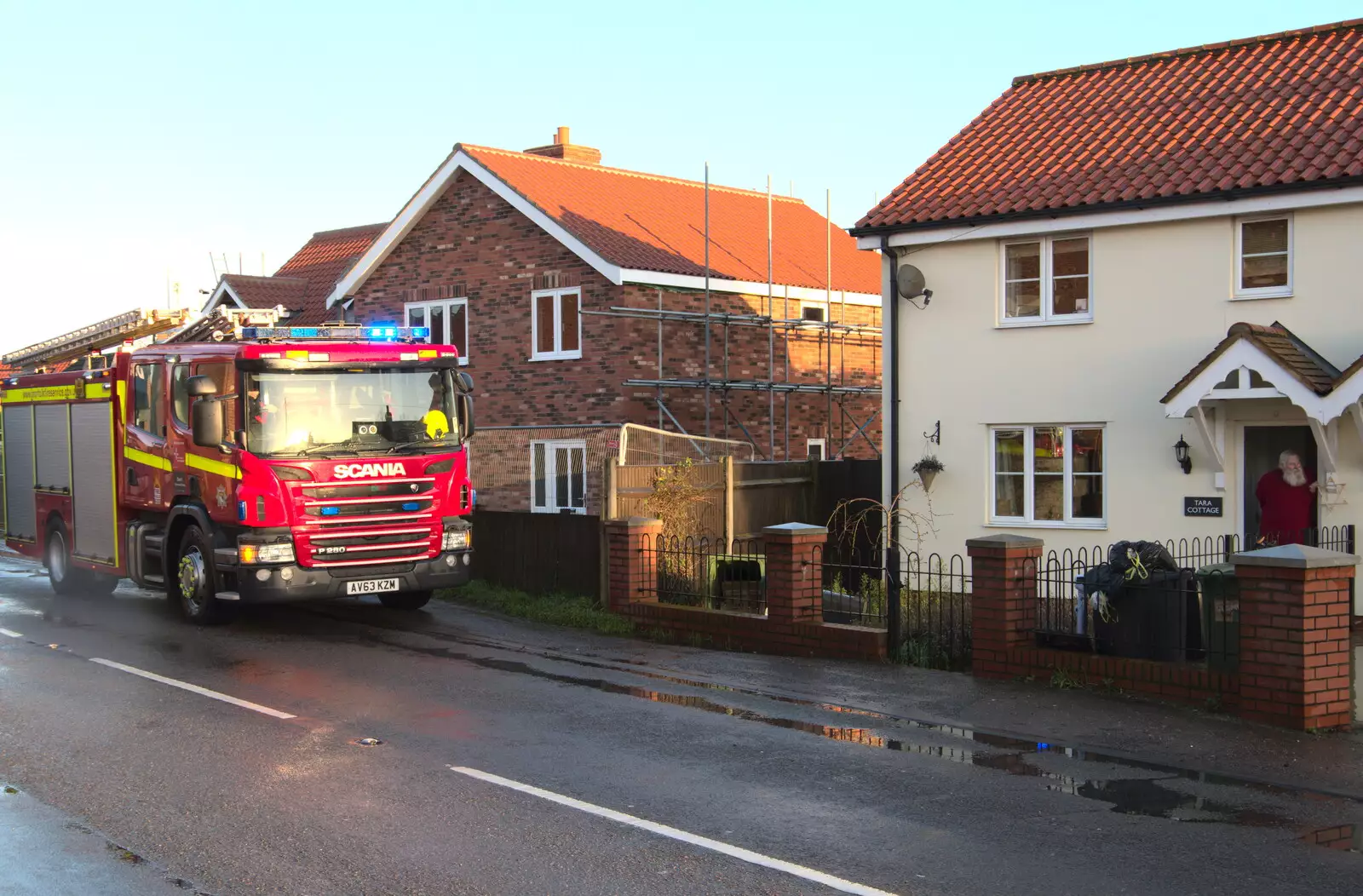 The fire engine is on standby for pumping, from The Christmas Eve Floods, Diss, Norfolk - 24th December 2020