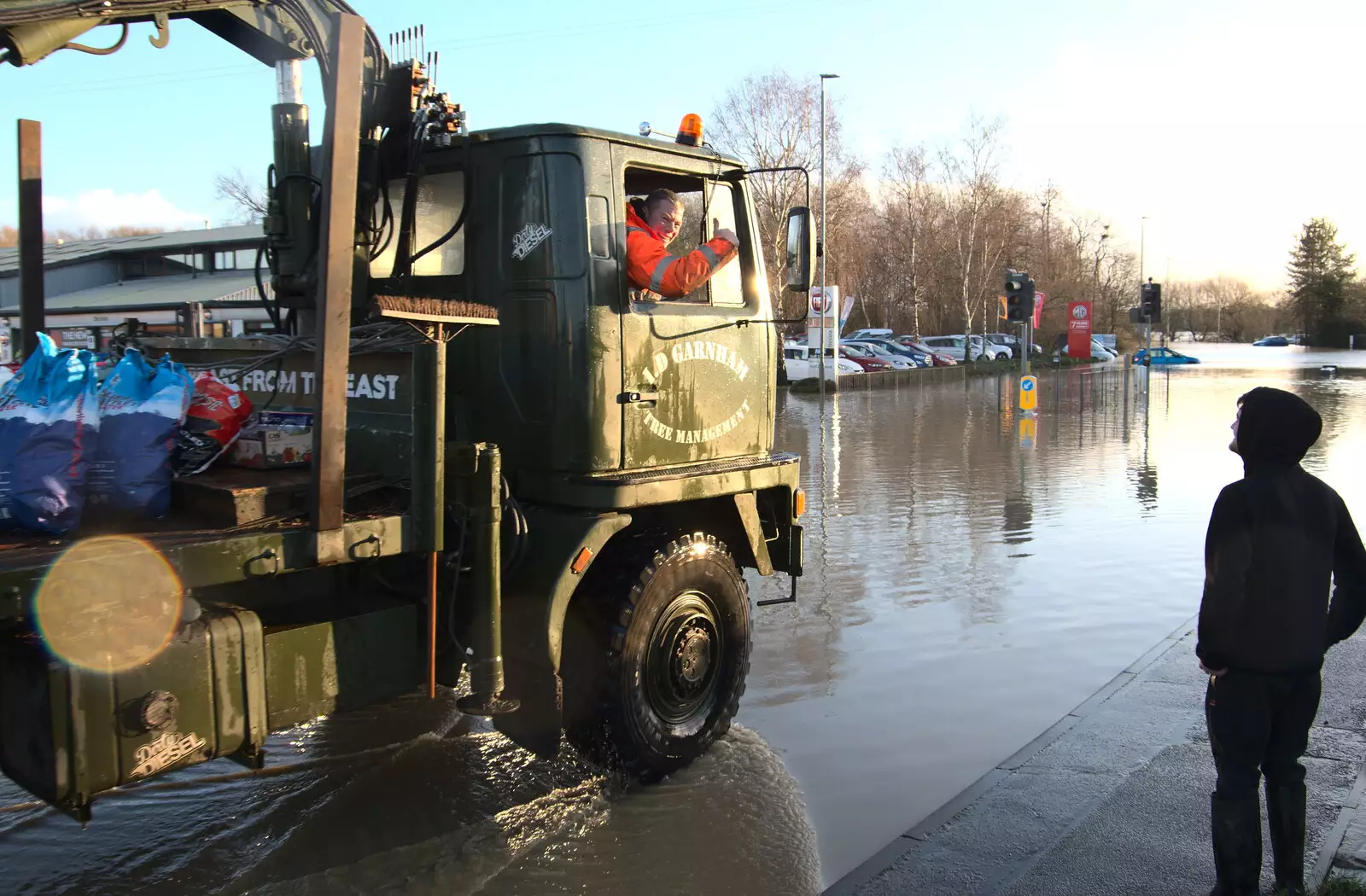 Thumbs-up from the Serious Loggin' driver, from The Christmas Eve Floods, Diss, Norfolk - 24th December 2020