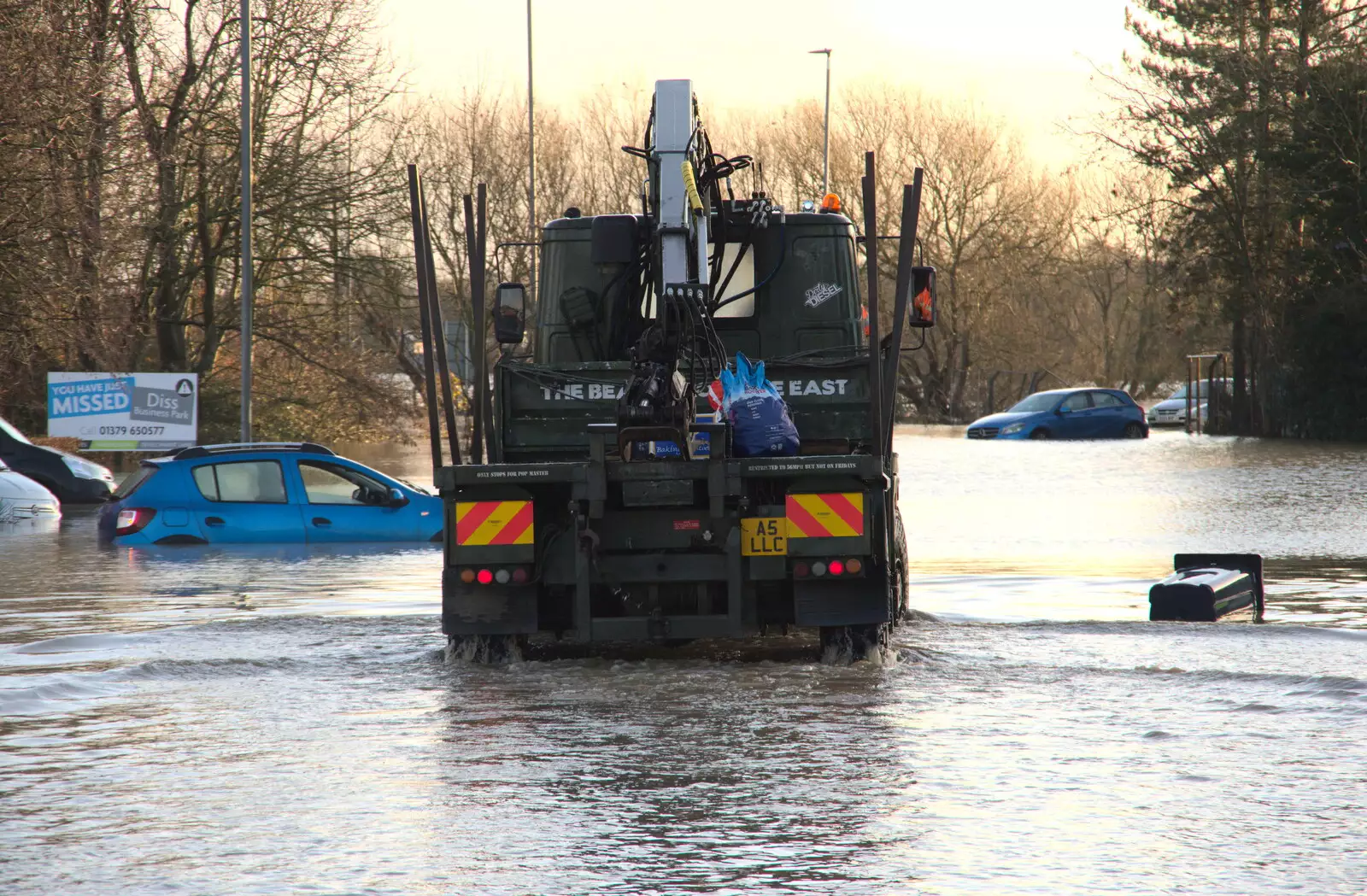 Driving through the floods, from The Christmas Eve Floods, Diss, Norfolk - 24th December 2020