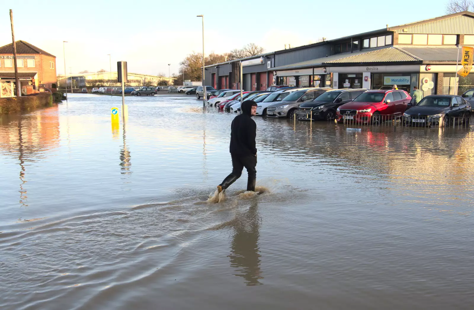 Someone walks through the floods to Desira, from The Christmas Eve Floods, Diss, Norfolk - 24th December 2020