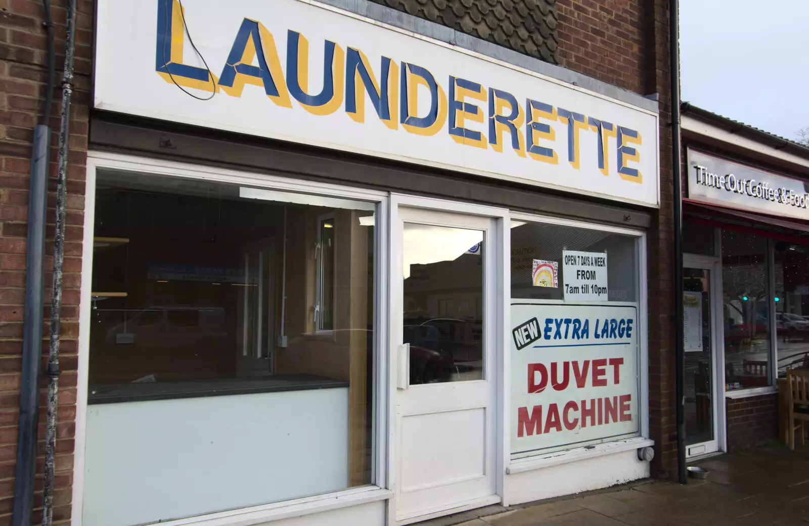 The peeling sign of the Laundrette in Mavery House, from The Christmas Eve Floods, Diss, Norfolk - 24th December 2020