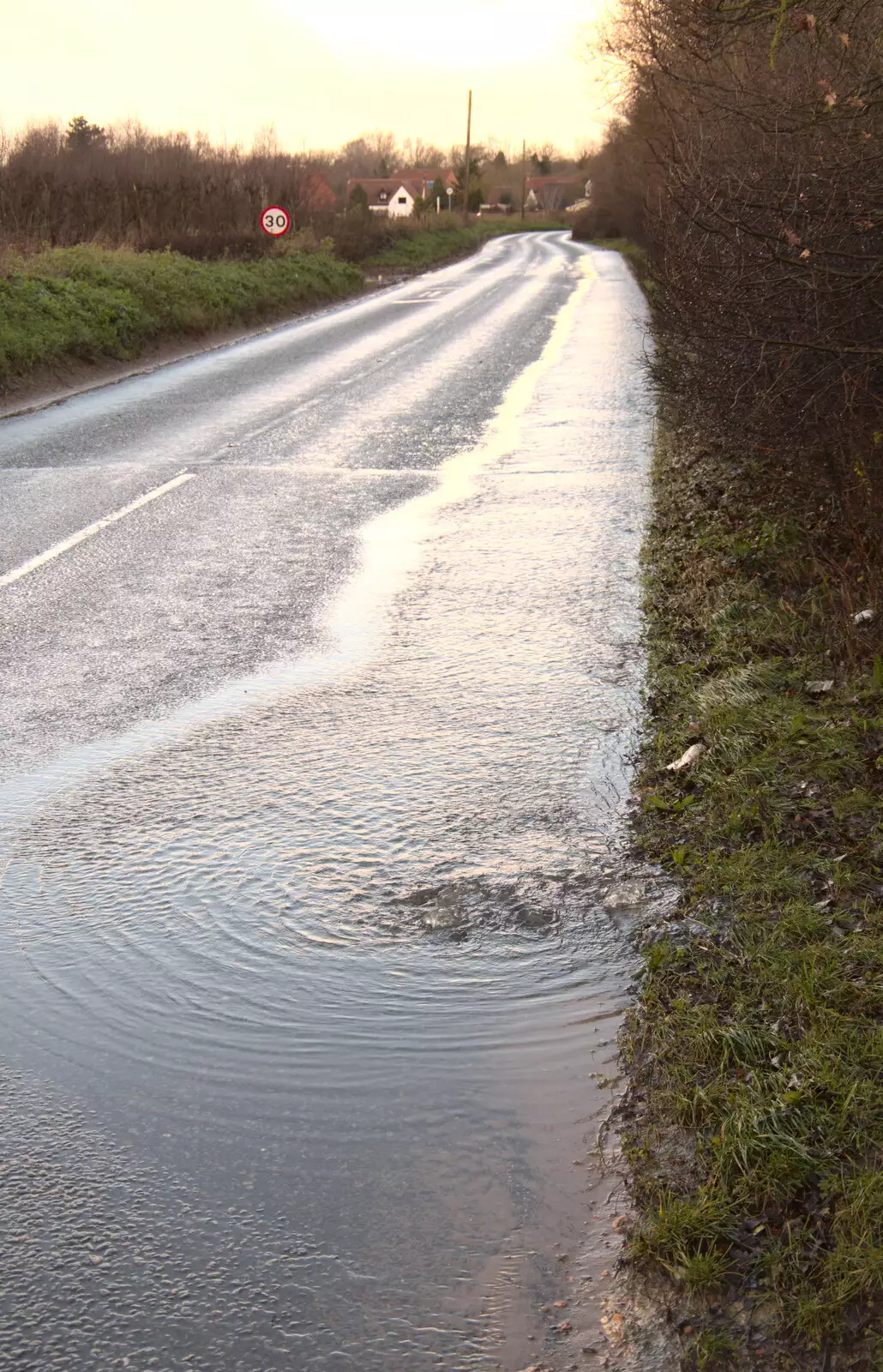 Water bubbles up from the drains near the Stuston S bends, from The Christmas Eve Floods, Diss, Norfolk - 24th December 2020