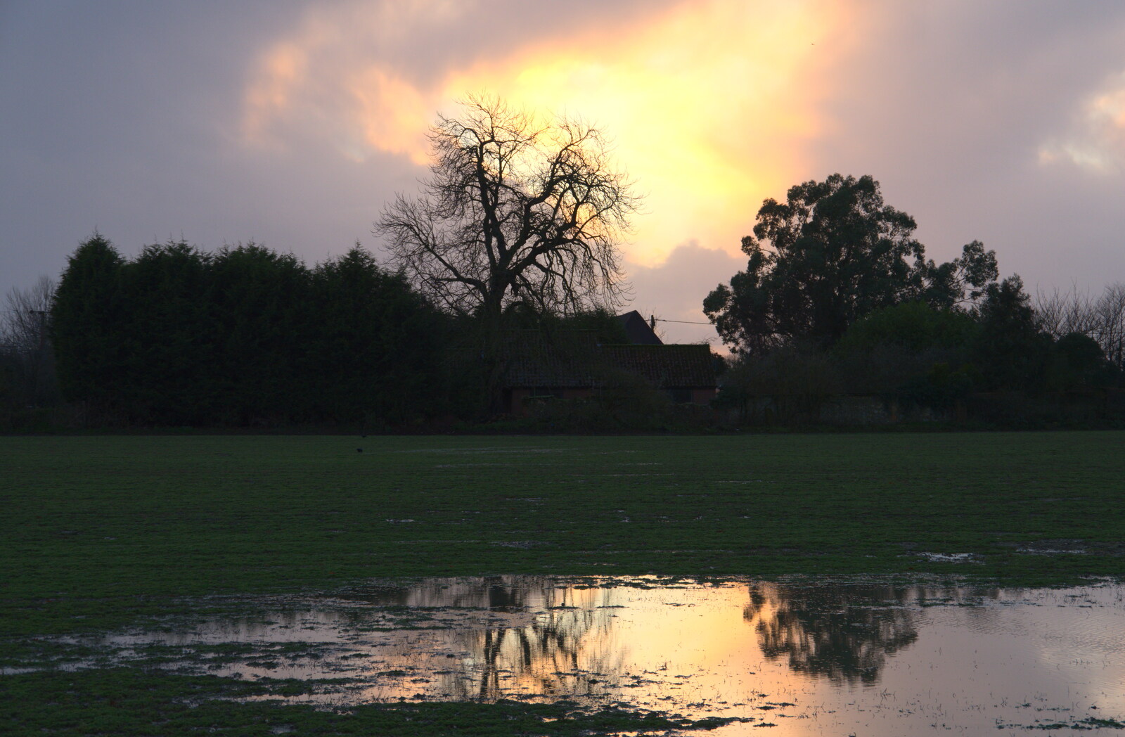 Angry sunset over the sodden side field from The Christmas Eve Floods, Diss, Norfolk - 24th December 2020