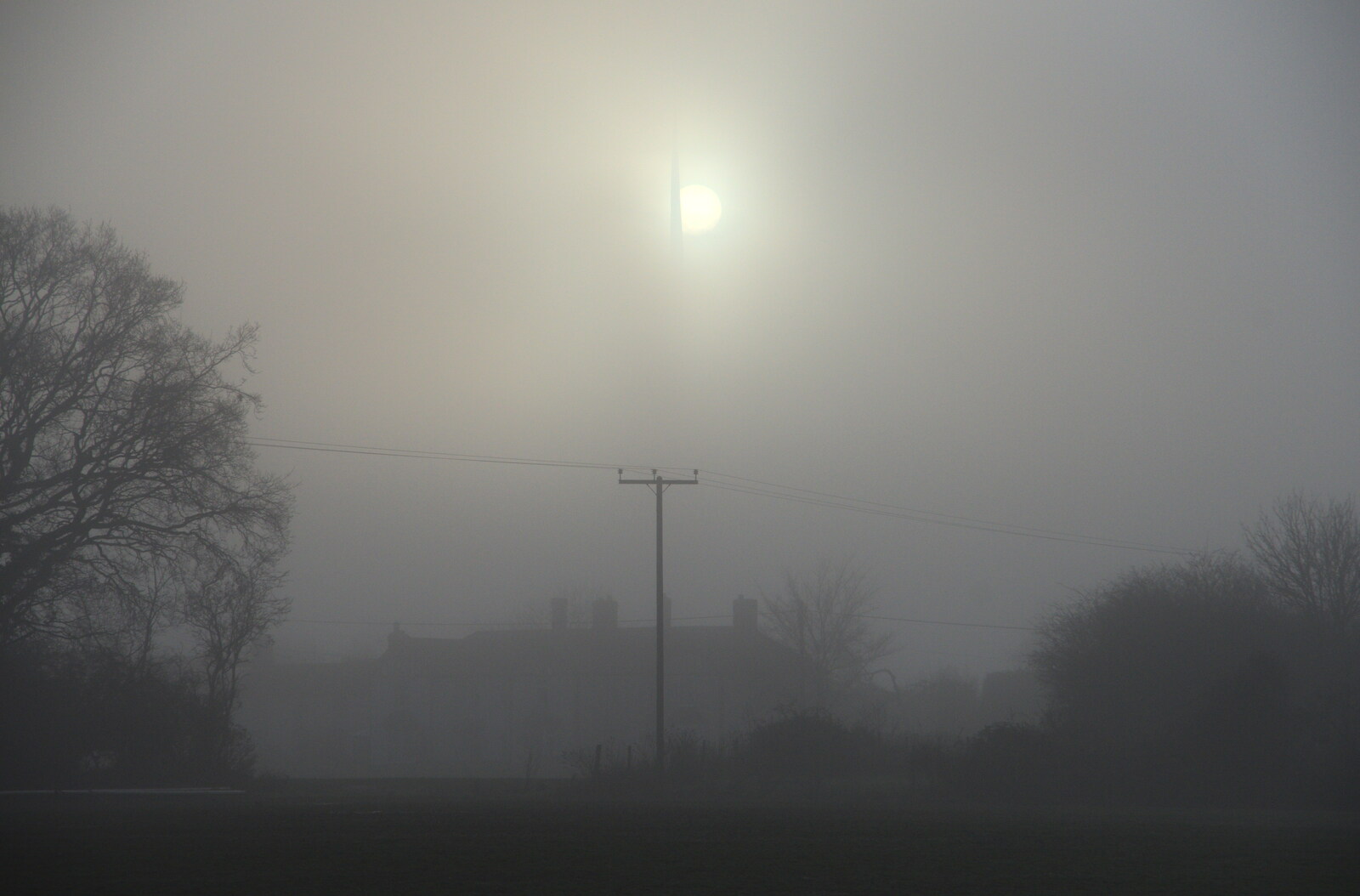 The blade of a turbine chops the sun from A Virtual New Year's Eve, Brome, Suffolk - 31st December 2020
