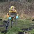 Harry leans on a sign, A Walk Around Redgrave and Lopham Fen, Redgrave, Suffolk - 3rd January 2021