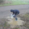 Harry scoops ice out of a puddle, Fun With Ice in Lockdown, Brome, Suffolk - 10th January 2021